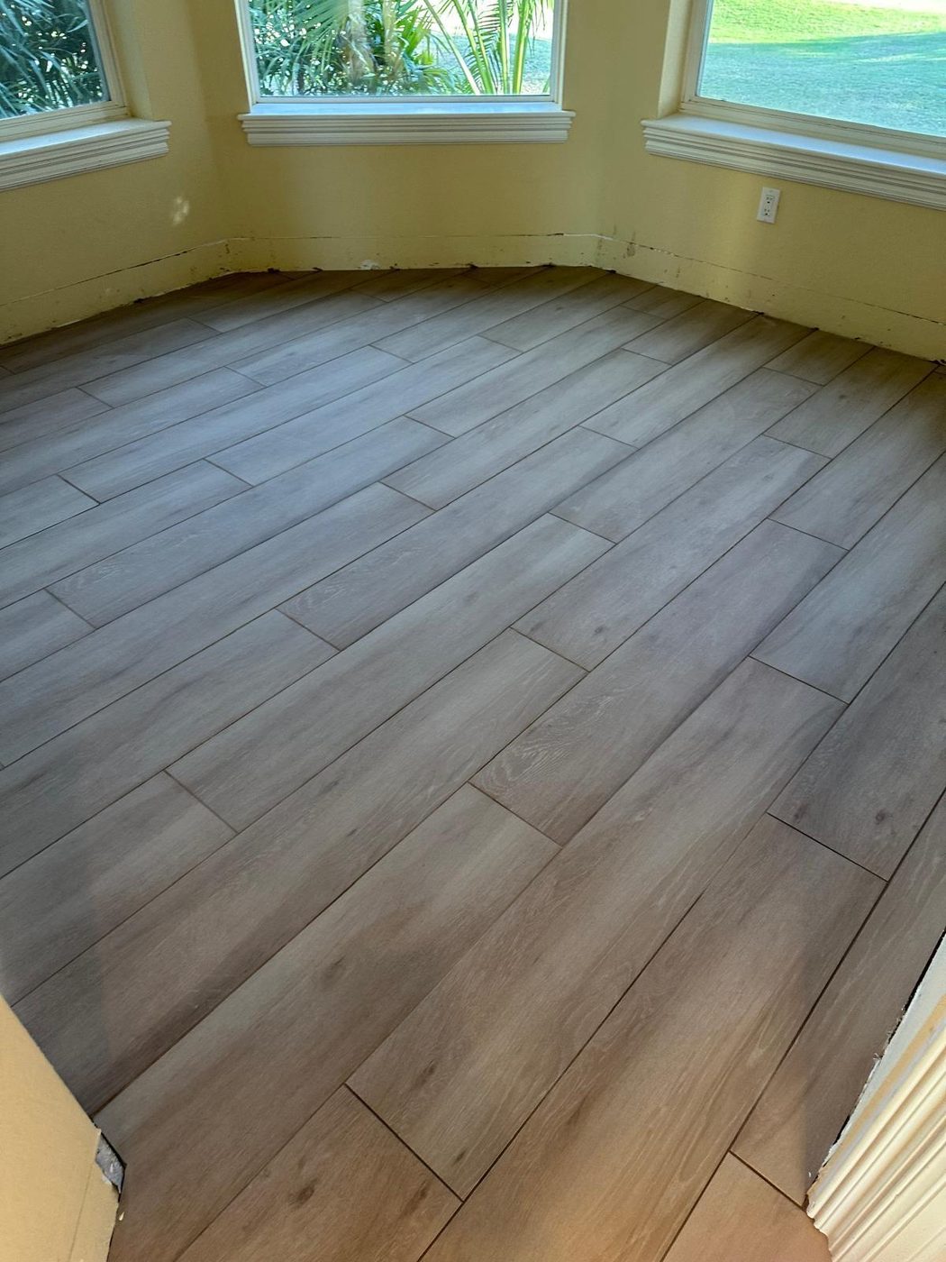 Gray LVP — Sunroom Install by Napas Flooring