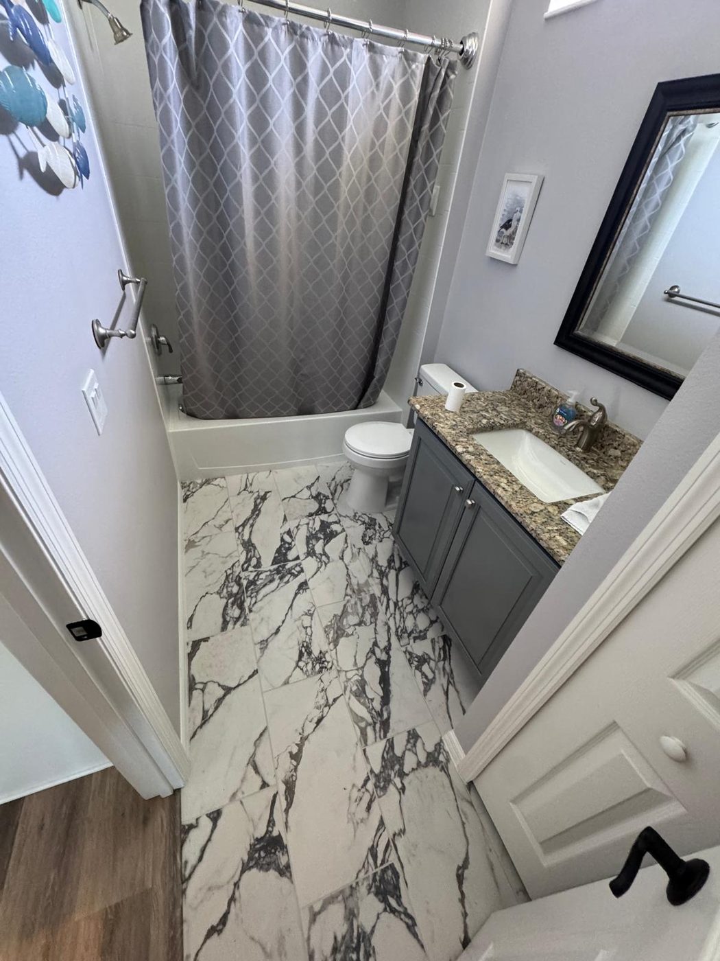 Calacatta Marble — Master Bathroom by Napas Flooring